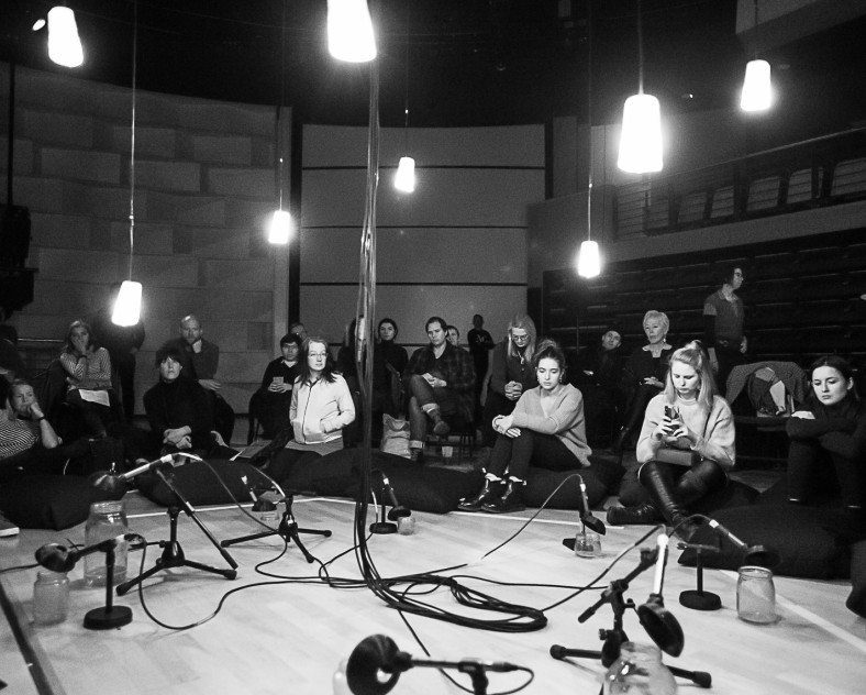 Audience seated inside the circular arrangement, eight lanterns surrounding them. Attenborough Centre, 2020.