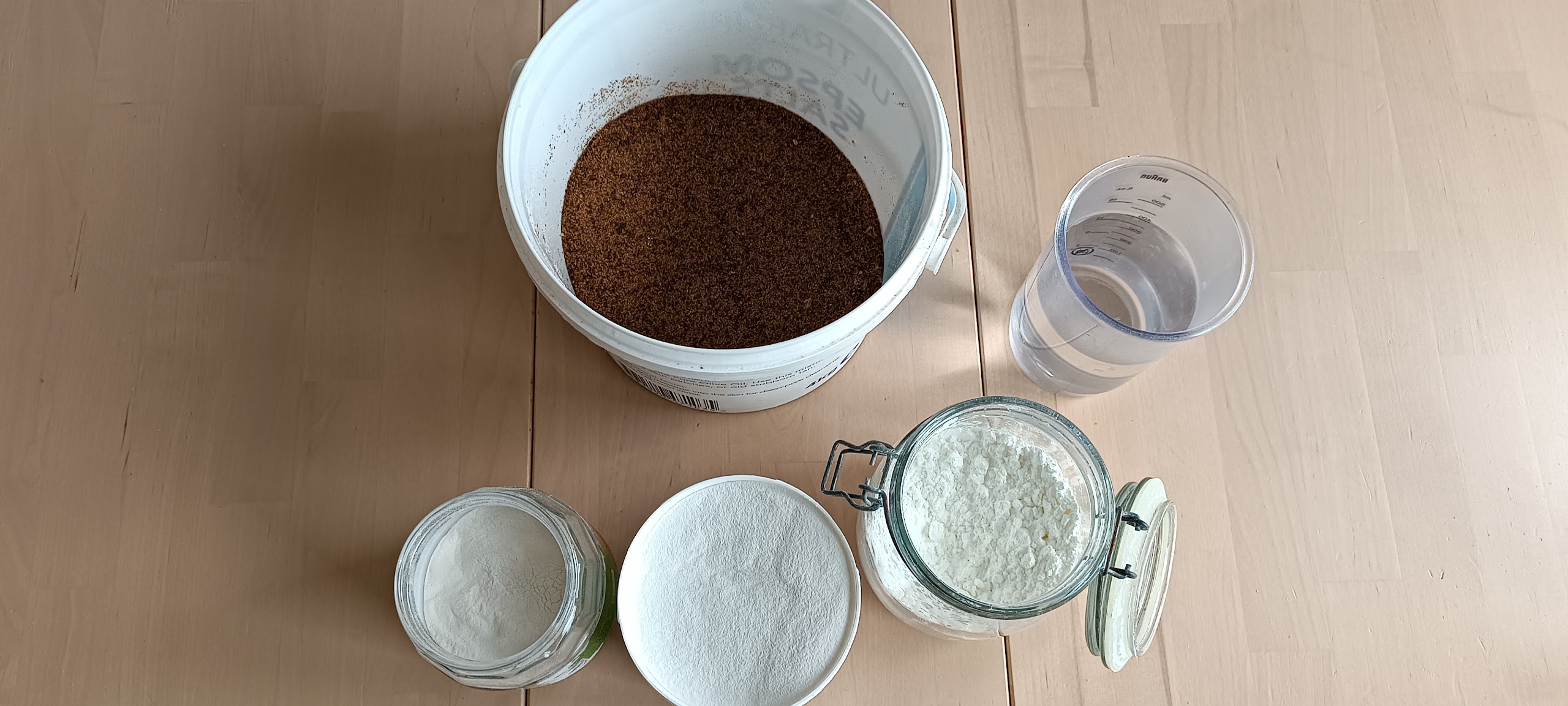Extrudable Bio-Pastes, four prepared bio-paste samples in separate containers.