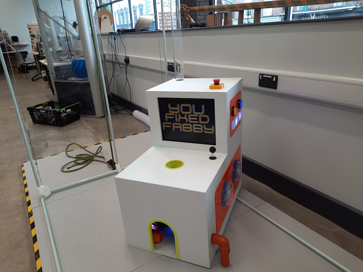 Fabby the FabLab Robot, large interactive robot sculpture with pulley system, crowd gathered around. Culture Night 2022.