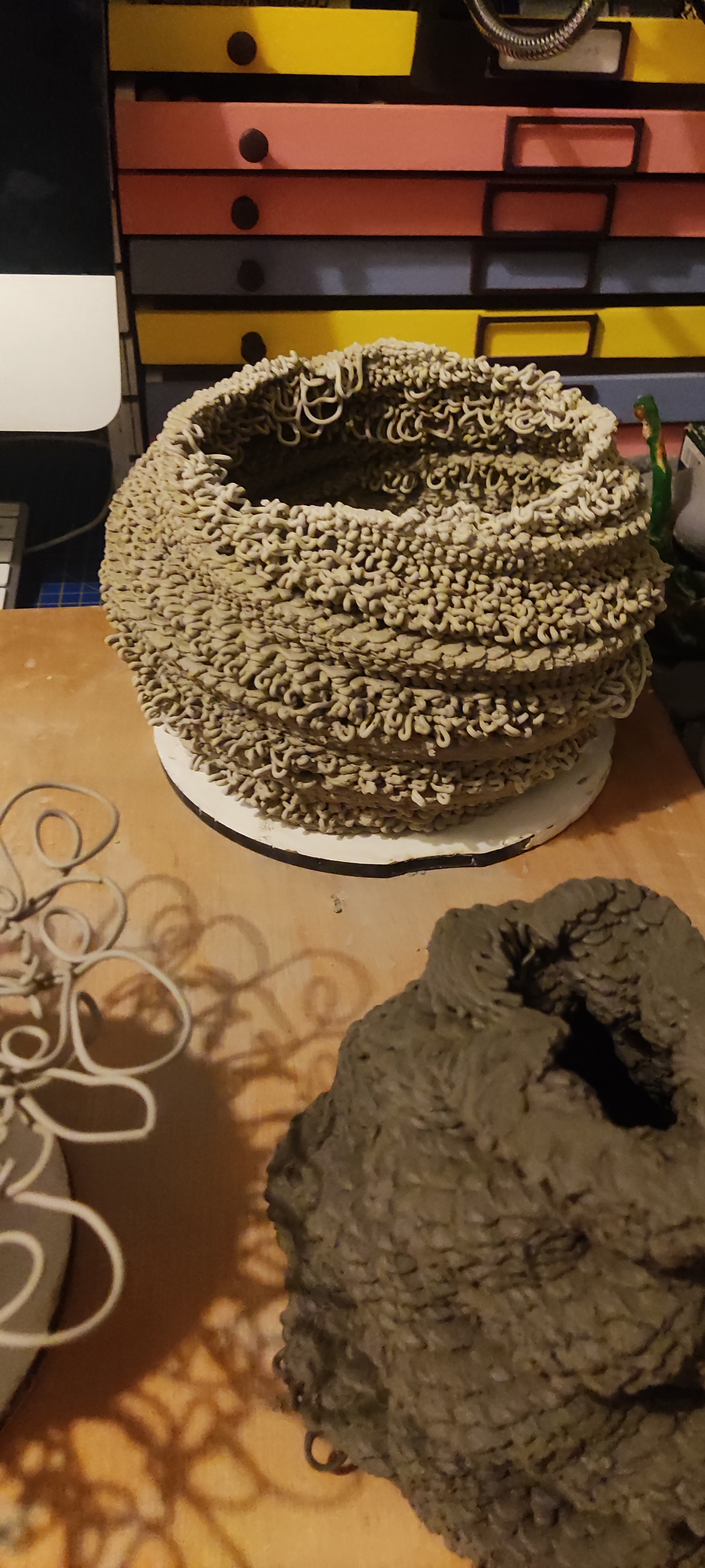 Failure test: non-planar deviation pushed beyond structural limit, clay slump visible at deviation point.